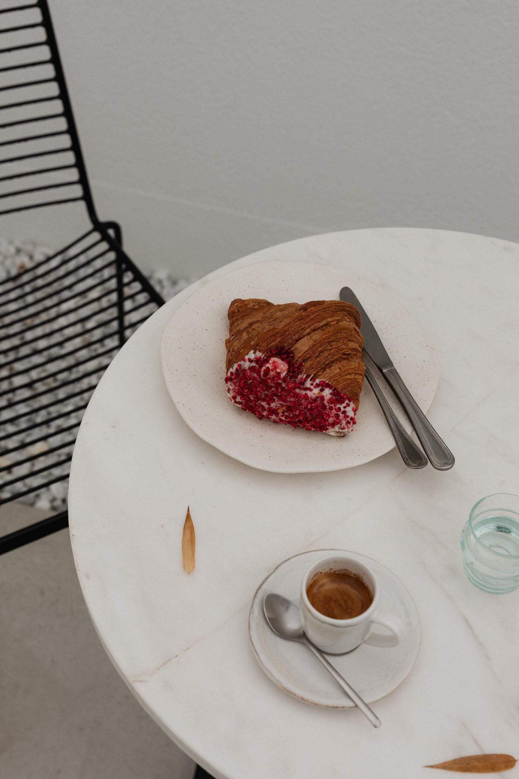 coffee and croisant on table